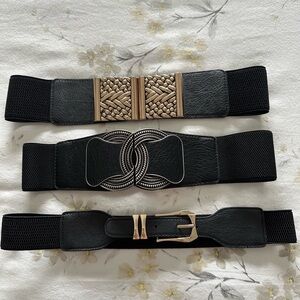 Set of 3 elastic black belts, 2 of them unused and the other very lightly used